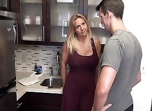 Naughty milf with big fake tits gets it in kitchen